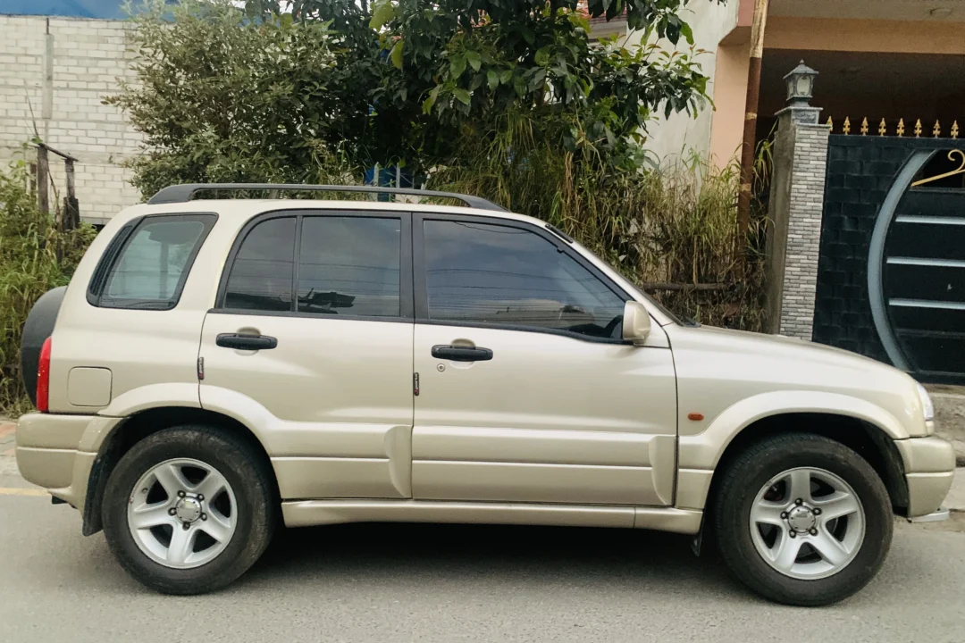 Silver SUV parked on the road