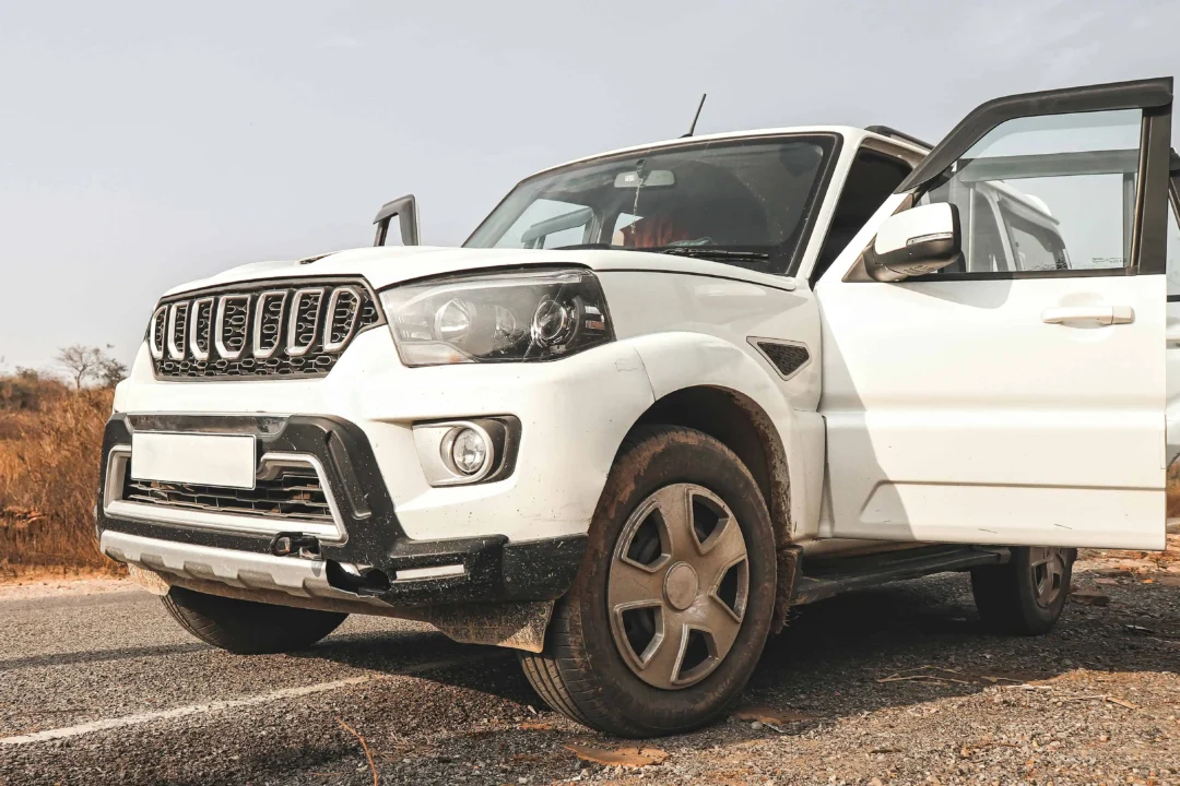 White SUV parked on roadside