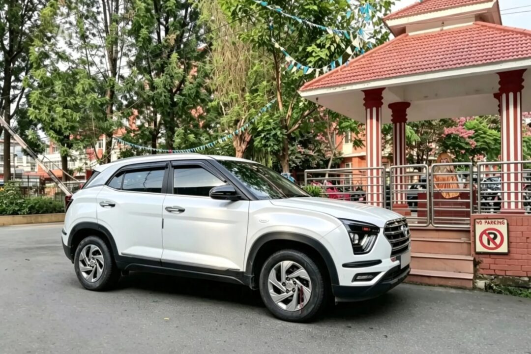Women Travelers in Nepal with SUV near pavilion