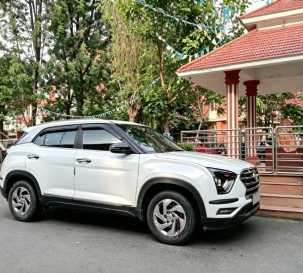 Women Travelers in Nepal with SUV near pavilion